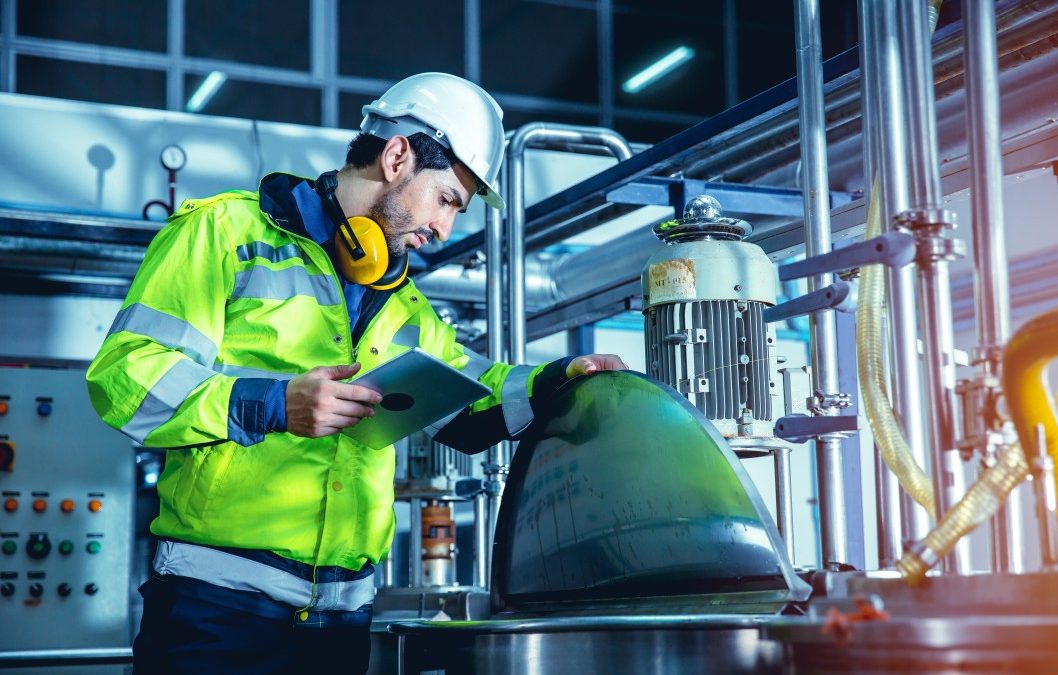 factory-worker-engineer-working-in-factory-using-tablet-computer-to-check-maintenance-boiler-water